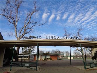 The Rio Linda Property owned by Twin Rivers - The front of Rio Linda School with the text on the front archway