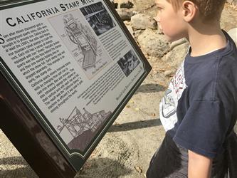 Hagginwood student reading about the Mill