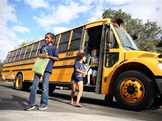 Students walking off Bus