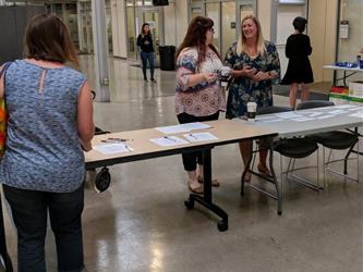 Teresa Rowan and Amy Kraft getting everyone checked in for Boot Camp
