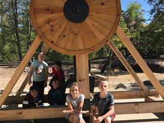 Westside students pose in front of the Mill